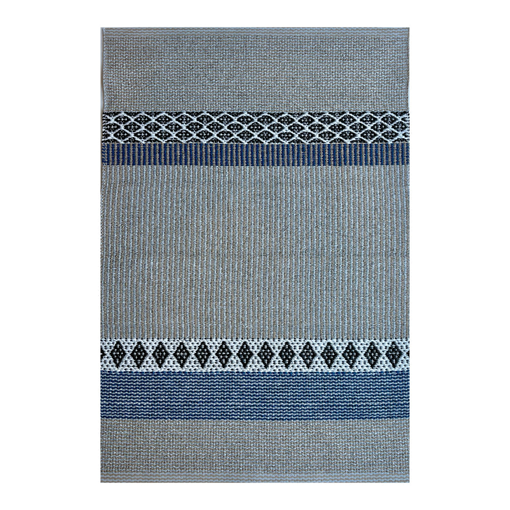 Gray rug with blue and white patterned border on a white background