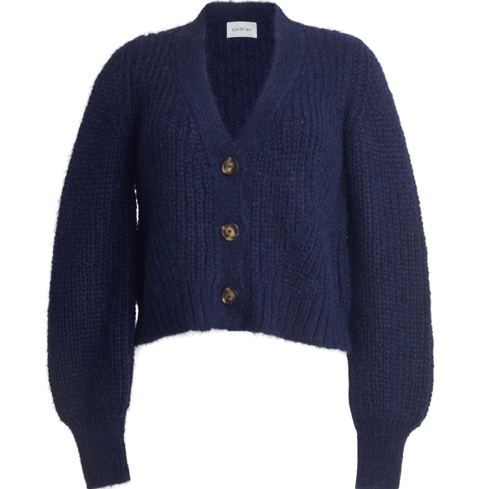 Navy blue cardigan with gold buttons on a white background