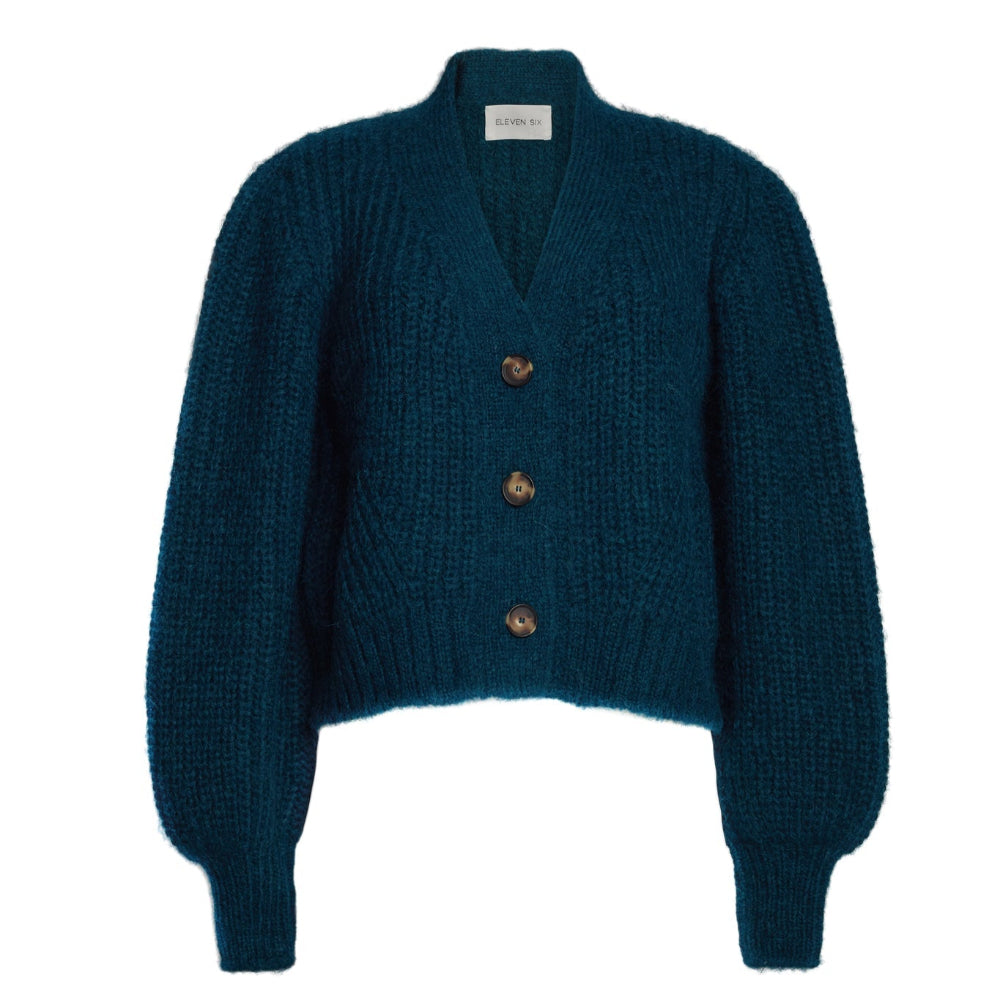 Teal knitted cardigan with brown buttons on a white background