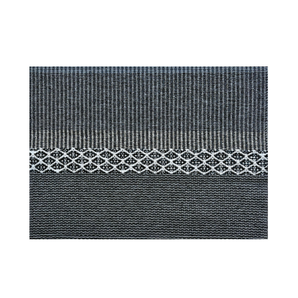 Textured patterned rug on a white background