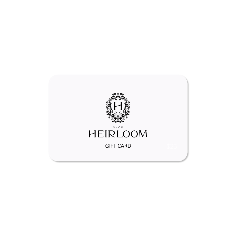 White gift card with 'Heirloom' logo and text on a white background