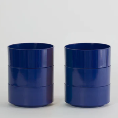 Three blue Hellerware Max bowls stacked on a white background
