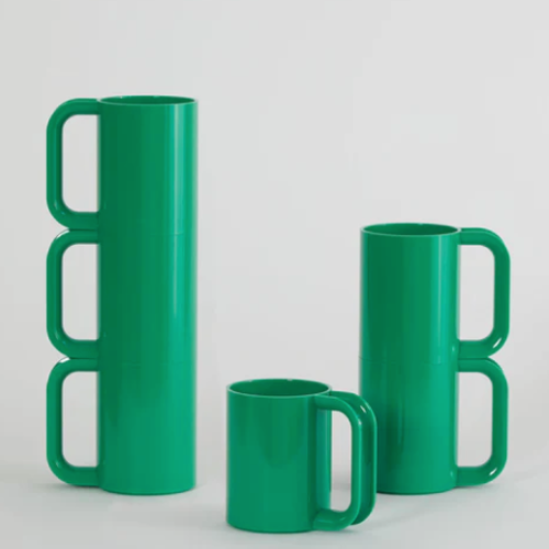 Green Heller Max Mugs on a white background.