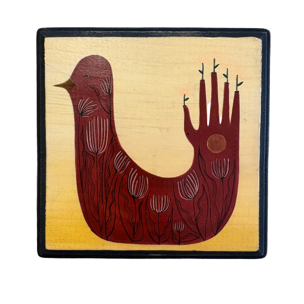 A square wooden wall art piece featuring a stylized bird shaped like a hand, painted in dark red with black linework and pale pink floral details, set against a pale yellow background with a black border.